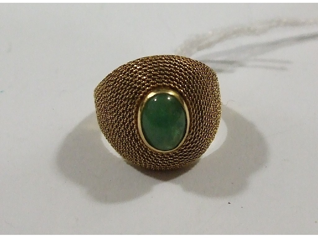 Appraisal: Eighteen carat gold jade single stone ring of bomb form