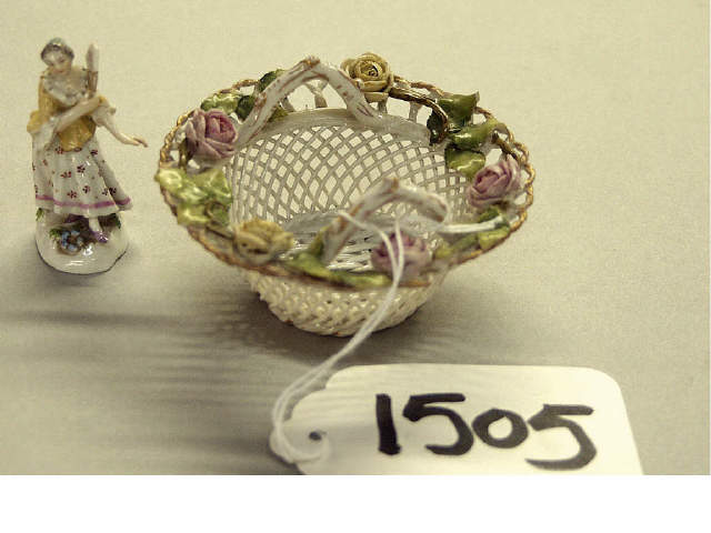 Appraisal: Collection including Meissen miniature lady with fan and intricately woven