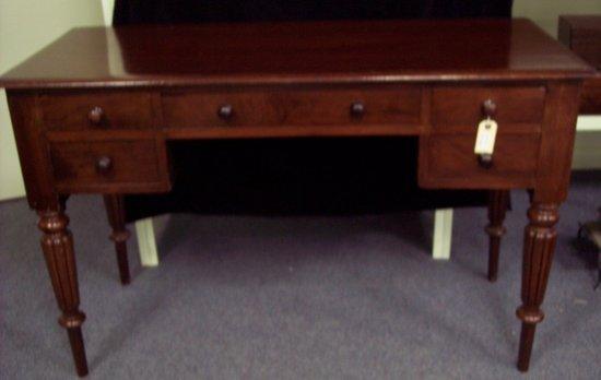 Appraisal: A th Century mahogany dressing table the rectangular top above