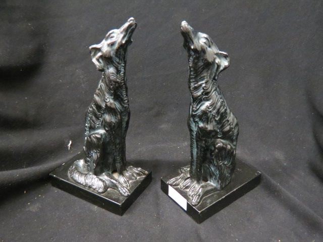 Appraisal: Pair of Figural Dog Bookends metal black paint deco era