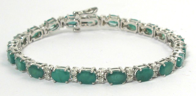 Appraisal: EMERALD DIAMOND AND WHITE GOLD BRACELET The k gold bracelet