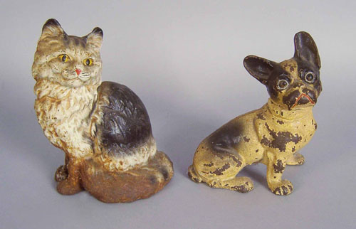 Appraisal: Two cast iron doorstops of a cat and a dog