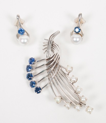 Appraisal: K white gold brooch and earrings enhanced with sapphires and