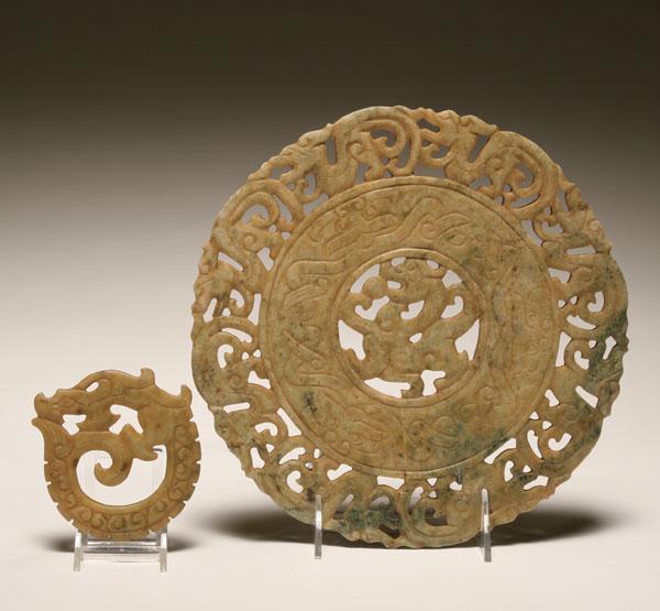 Appraisal: Two soapstone carved discs large disc with piercework dragons surrounding