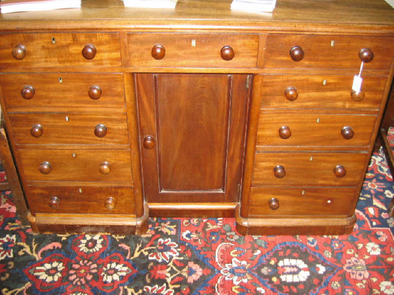 Appraisal: ENGLISH MAHOGANY KNEE HOLE DESK The molded rectangular top above