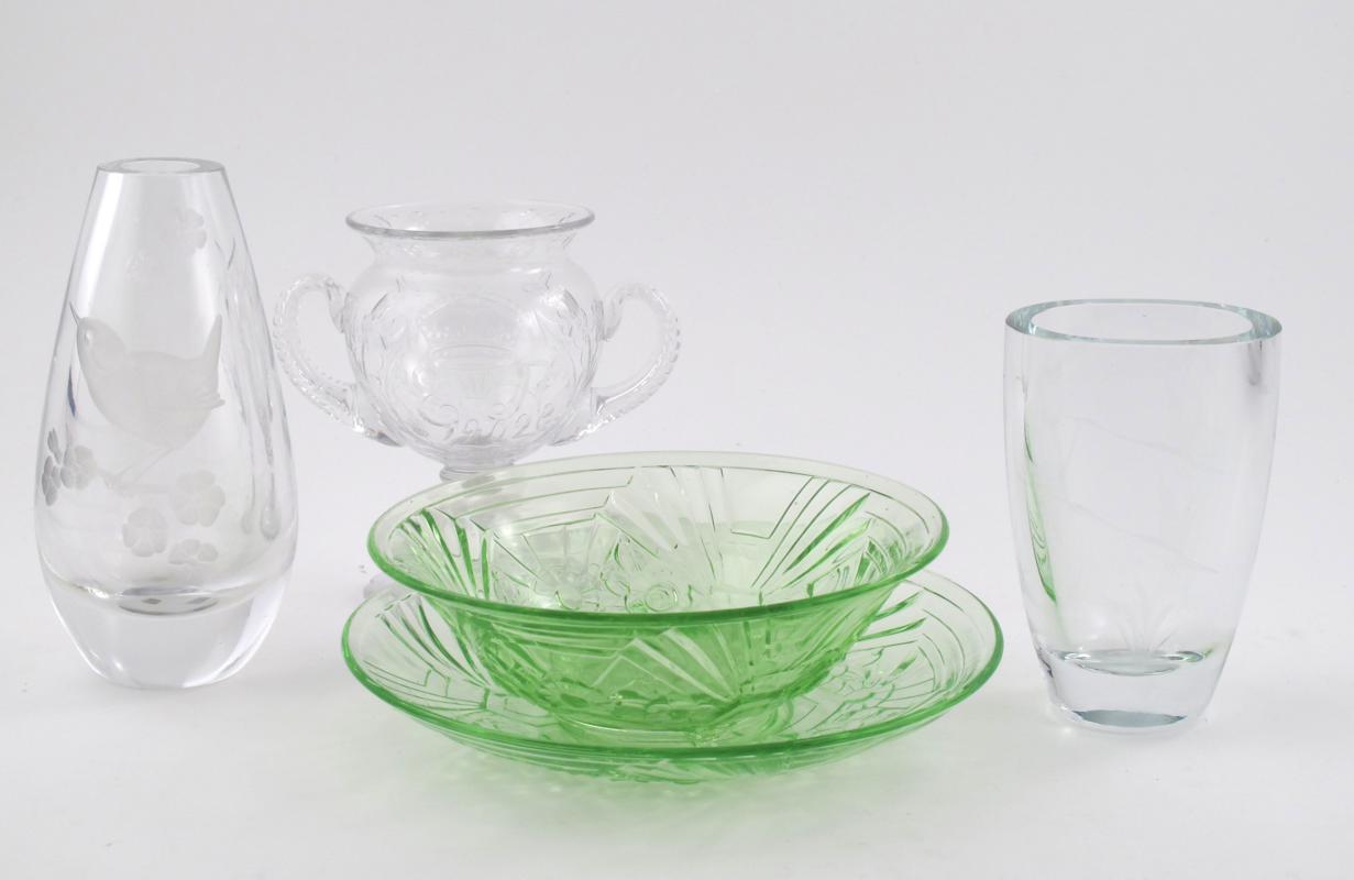 Appraisal: A Jobling press moulded green glass salad server and saucer