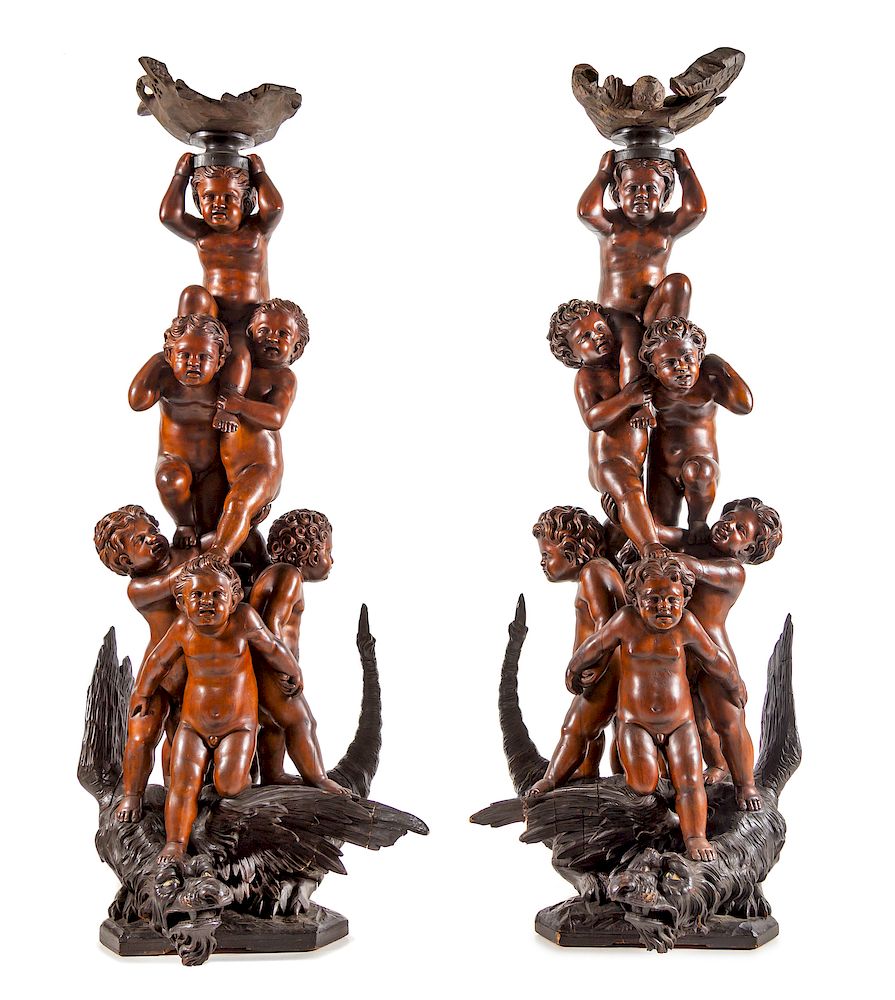 Appraisal: A Pair of Monumental Venetian Baroque Style Carved Walnut Torch