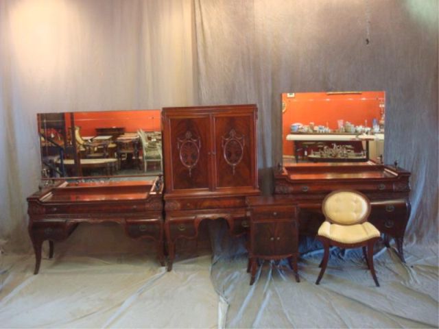 Appraisal: Mahogany Neoclassical Style Bed Set Includes chest vanity dresser chifferobe