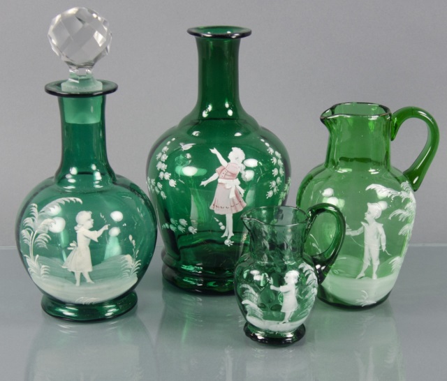 Appraisal: Mary Gregory Emerald Green Decanters PitchersAll four pieces decorated with