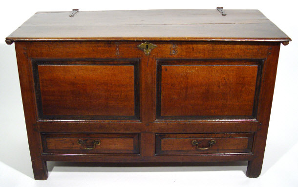 Appraisal: th Century oak coffer with panelled front and two drawers