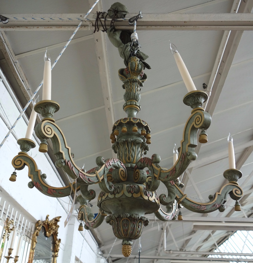 Appraisal: A modern polychrome painted wooden six branch chandelier the acanthus