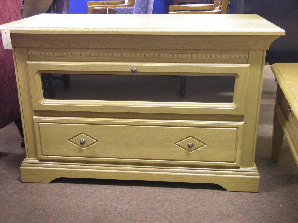 Appraisal: A modern Belgian oak television and DVD cabinet with dentil