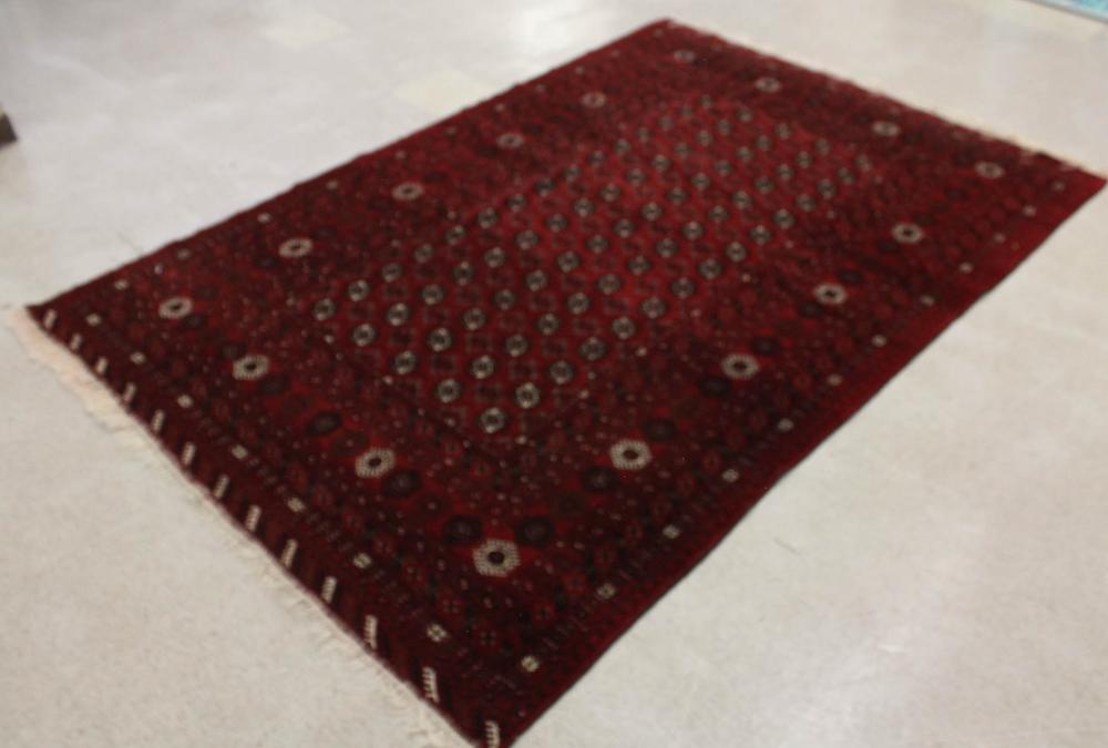 Appraisal: HAND KNOTTED AFGHAN TURKMEN CARPET Tekke Bokhara design on red