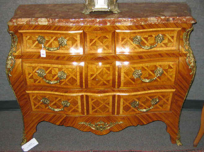 Appraisal: FRENCH LOUIS XV STYLE MARBLE TOP COMODE having three drawers