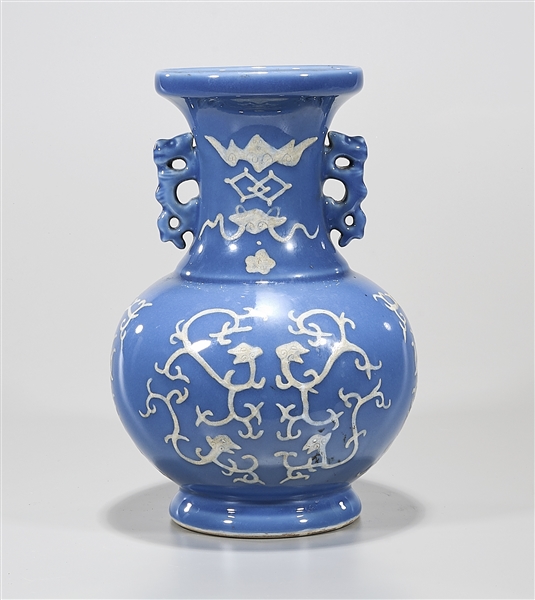 Appraisal: Chinese blue glazed porcelain vase with white chilong designs in