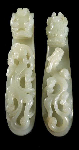 Appraisal: Two pale greenish-white jade belt hooks th Century Each finely