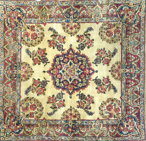 Appraisal: Kerman rug with floral center medallion in an ivory field