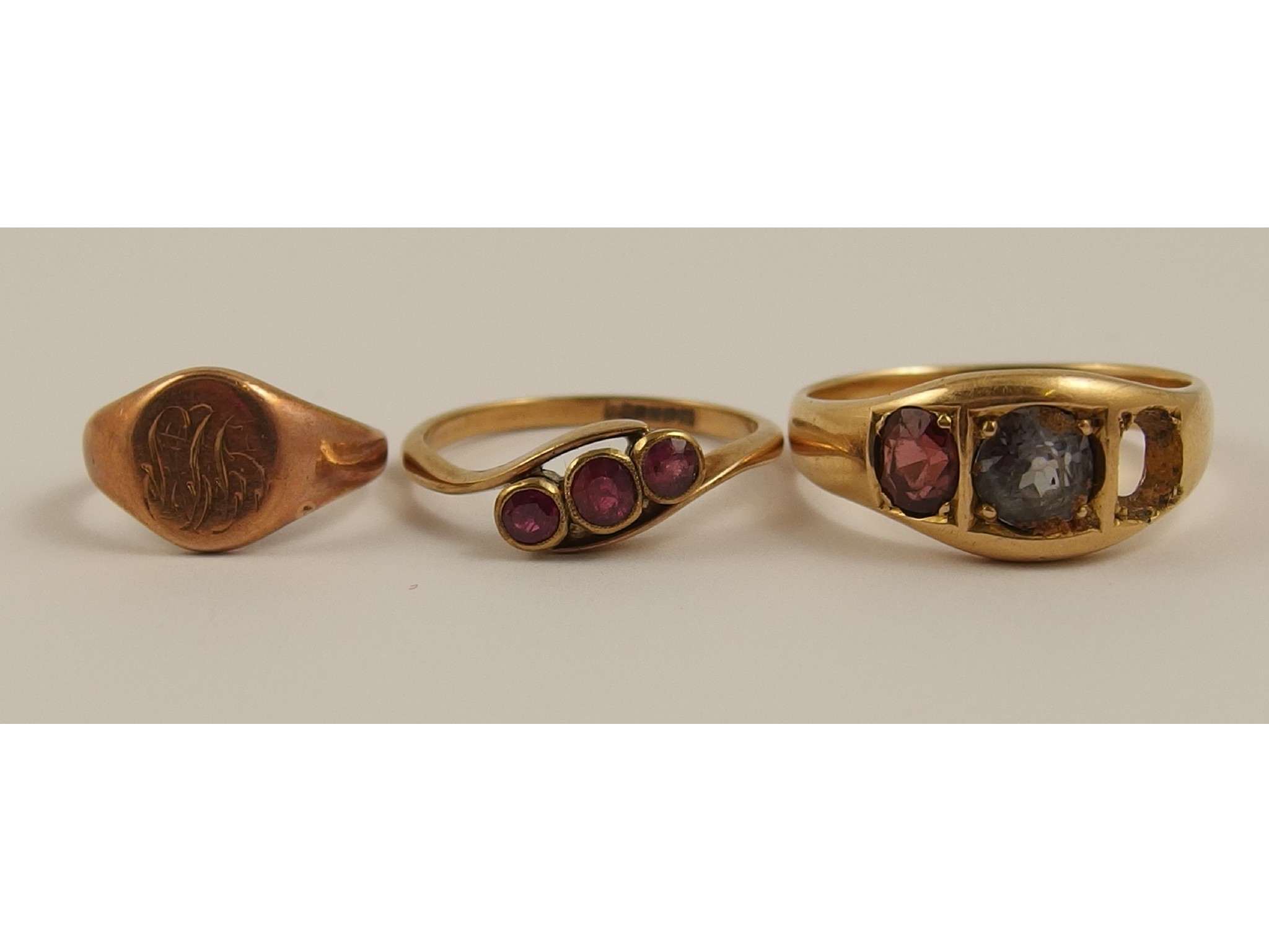 Appraisal: A ct rose gold signet ring and two yellow metal