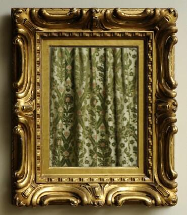 Appraisal: ROCOCO-STYLE GILTWOOD WALL MIRROR The rectangular mirror plate in conforming