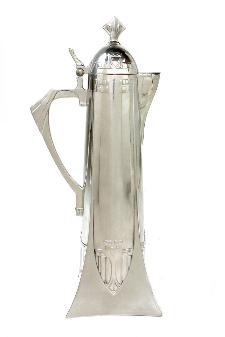 Appraisal: A WMF hinge lidded claret jug of tapered Art Deco