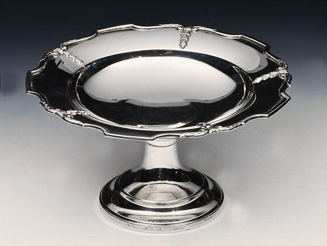 Appraisal: AN OPEN SILVER DISH on pedestal foot of shaped circular