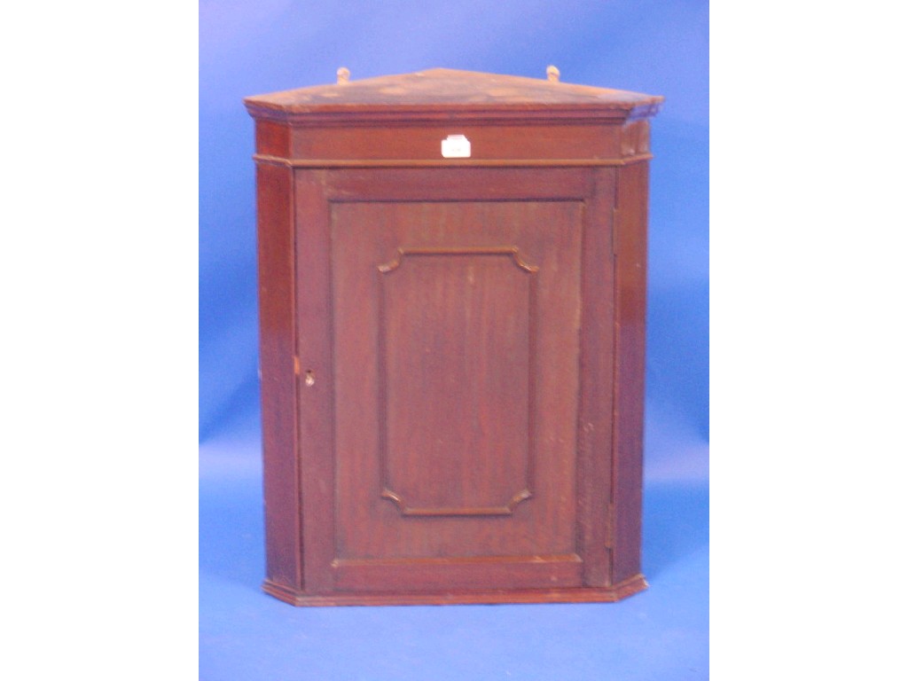 Appraisal: An Edwardian mahogany hanging corner cupboard cm high