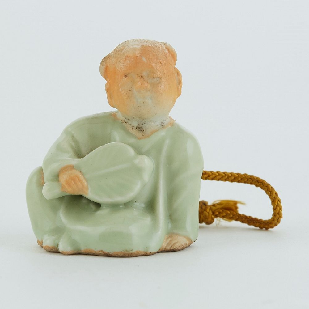 Appraisal: Japanese Meiji Hirado Porcelain Netsuke of a Child Japanese Meiji