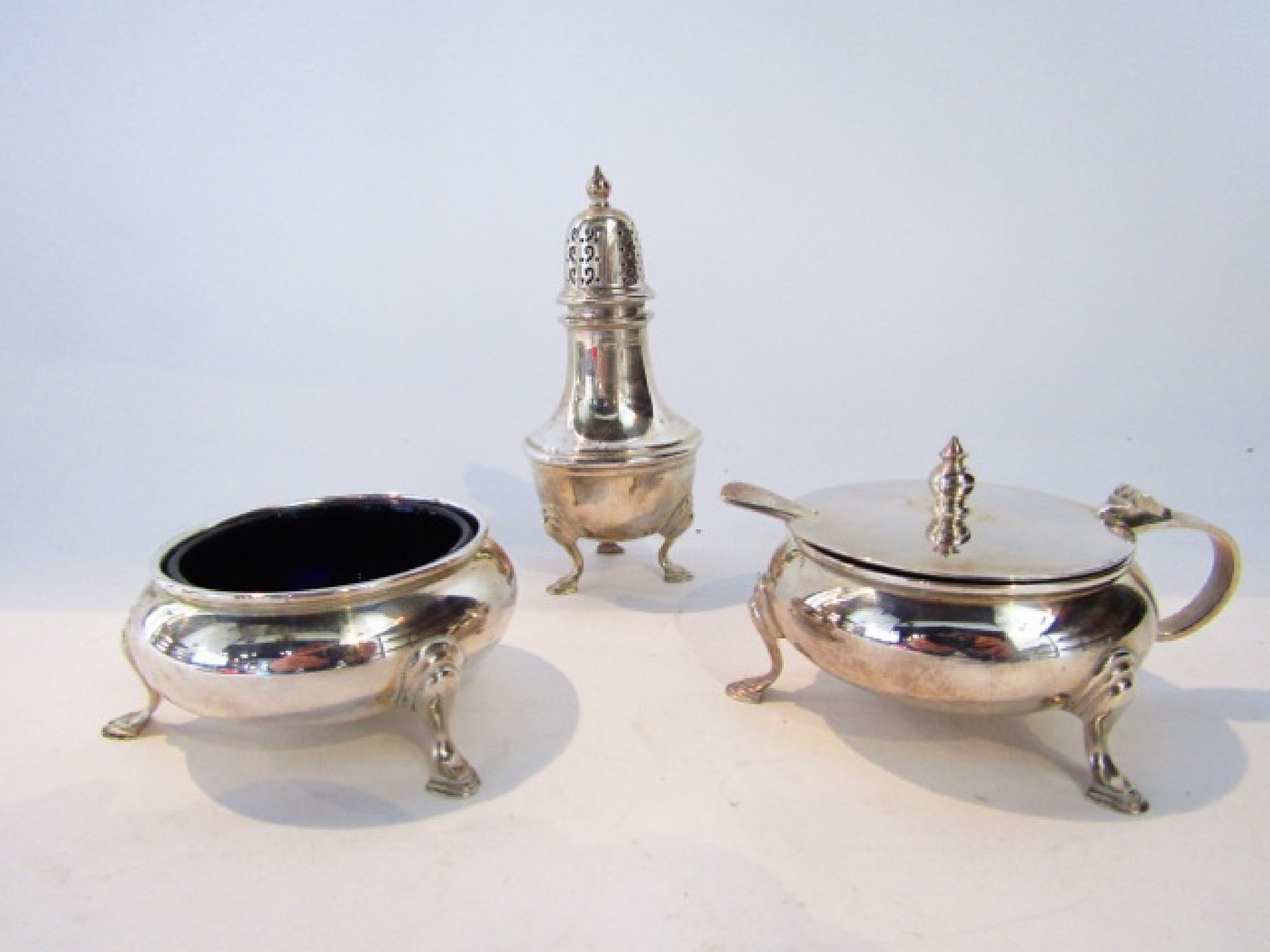 Appraisal: A silver cruet set S J Rose Son Birmingham comprising