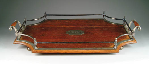 Appraisal: SILVER PLATE AND OAK HANDLED SERVING TRAY The cut corner