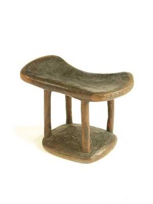 Appraisal: A South African headrest with a slightly curved shaped platform