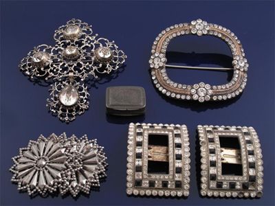 Appraisal: A pair of paste set buckles A brooch formed from