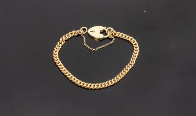 Appraisal: An ct yellow gold curb link bracelet with heart shaped