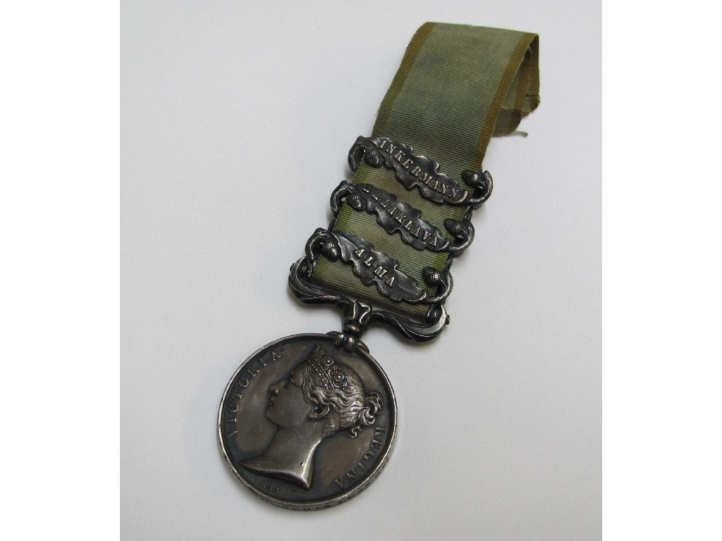 Appraisal: A Crimea War medal with three oak leaf clasps -