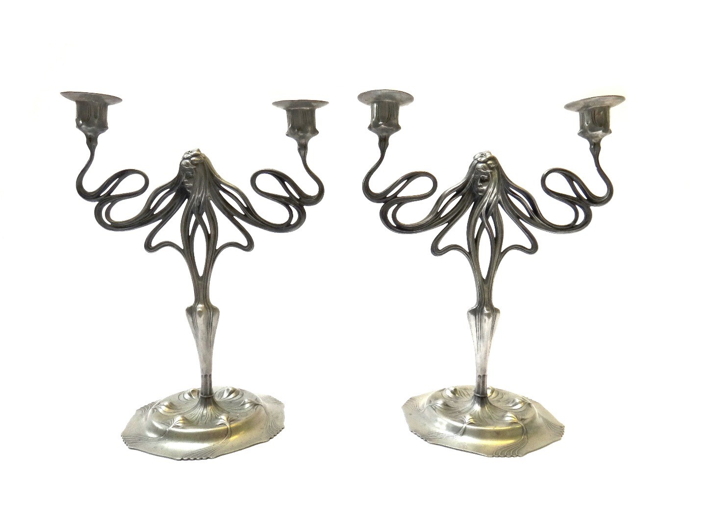 Appraisal: A pair of Orivit twin branch pewter figural candlesticks early