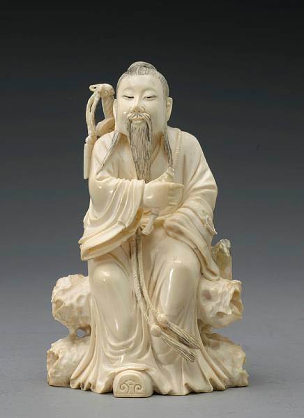 Appraisal: A ivory seated figure of a Daoist immortal th Century