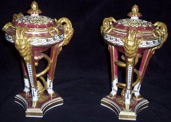 Appraisal: A pair of Samson puce decorated pastille burners the pierced