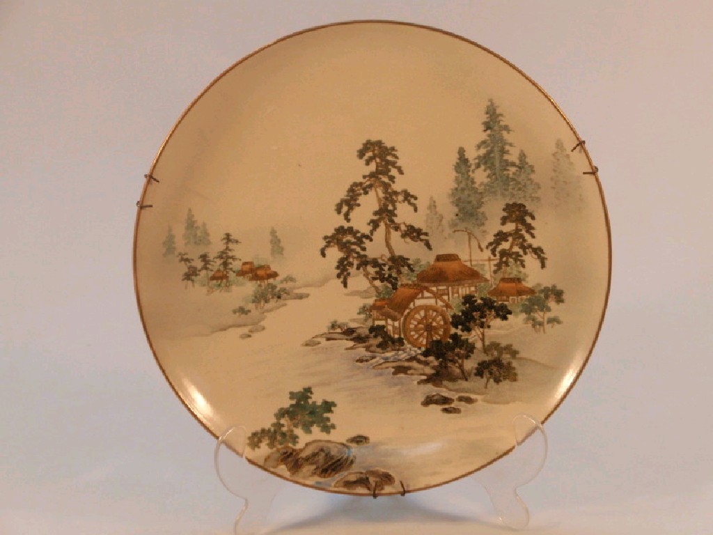 Appraisal: A Japanese Satsuma earthenware charger painted and gilt with rural