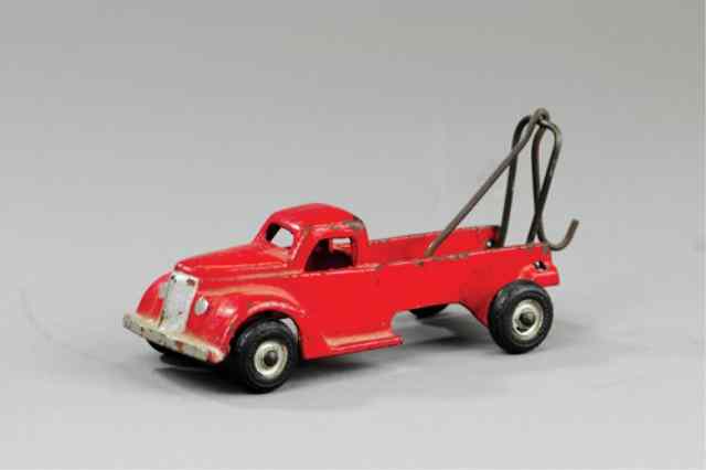 Appraisal: ARCADE WRECKER TRUCK Cast iron painted in red body wire