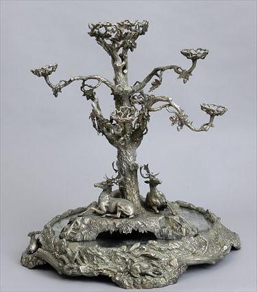 Appraisal: LARGE SILVER-PLATED EPERGNE The tree-form stem with branches rising from