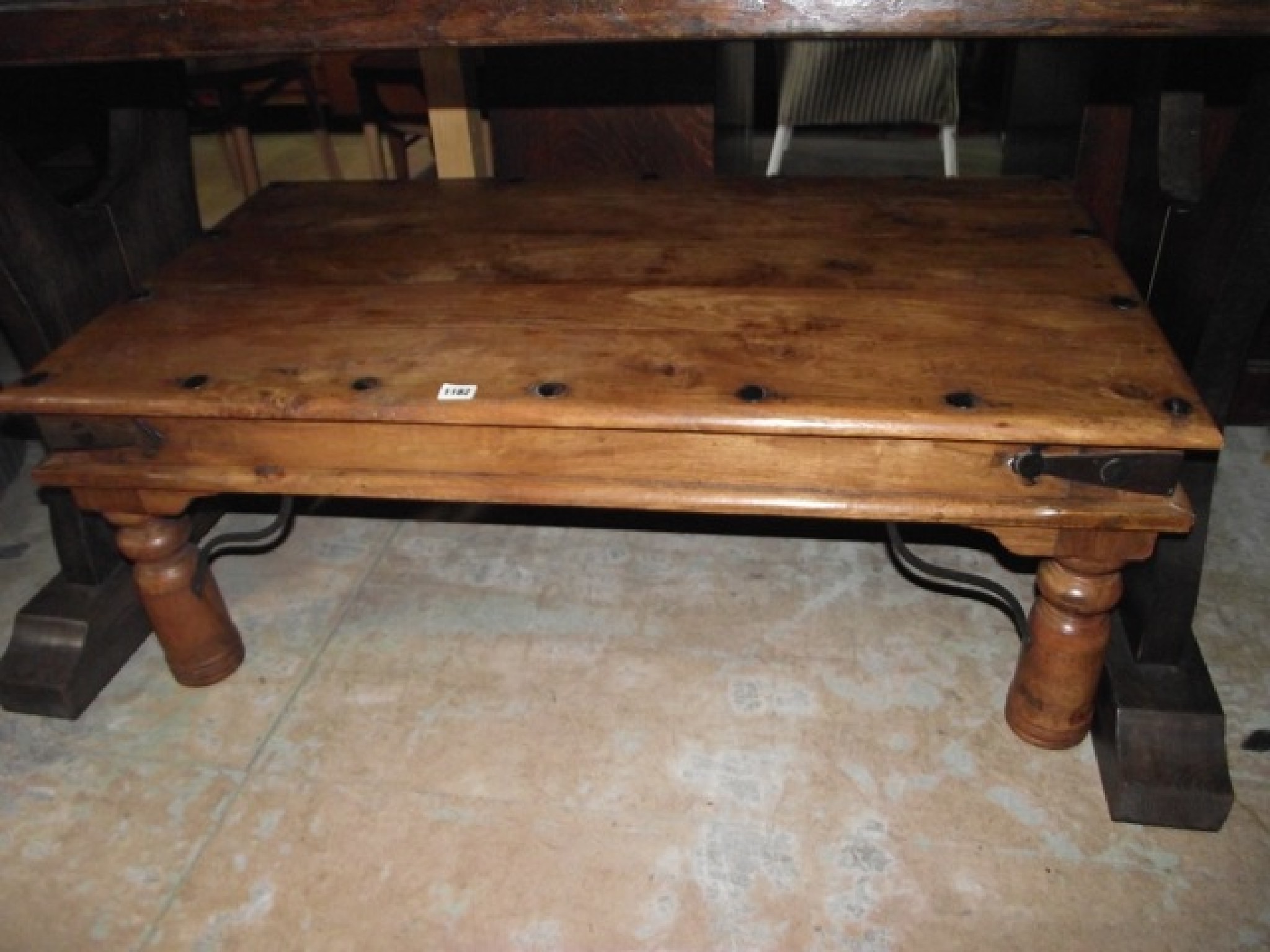 Appraisal: A low Indian hardwood occasional table of rectangular form raised