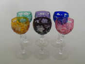 Appraisal: A set of six wine glasses with slice cut stems