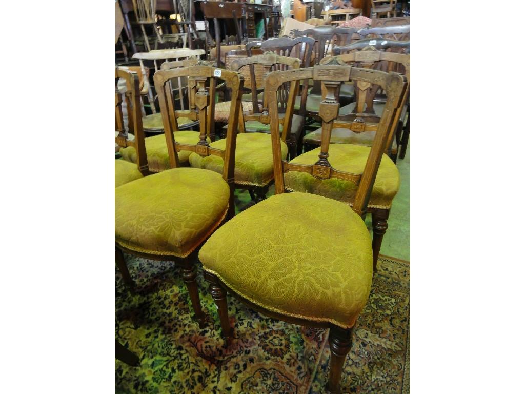 Appraisal: A set of six inlaid Edwardian walnut dining chairs with