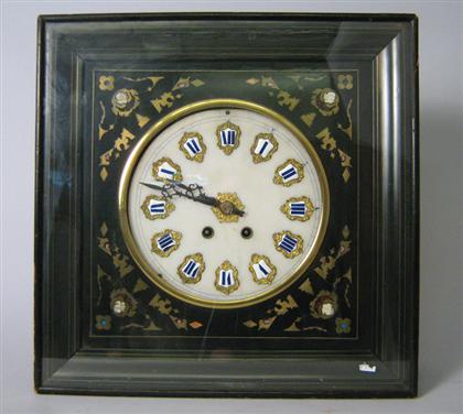 Appraisal: Wall clock Of ebonized wood with brass inlaid details in