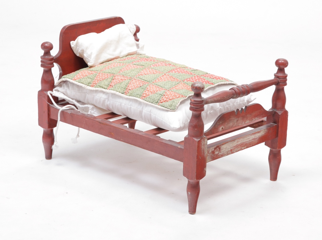 Appraisal: COUNTRY EMPIRE DOLL BED WITH DRESSINGS American mid- th century