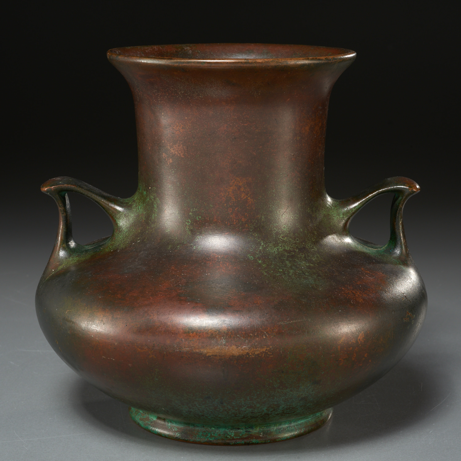 Appraisal: C W CLEWELL TWO-HANDLE BRONZE VASE c red green and