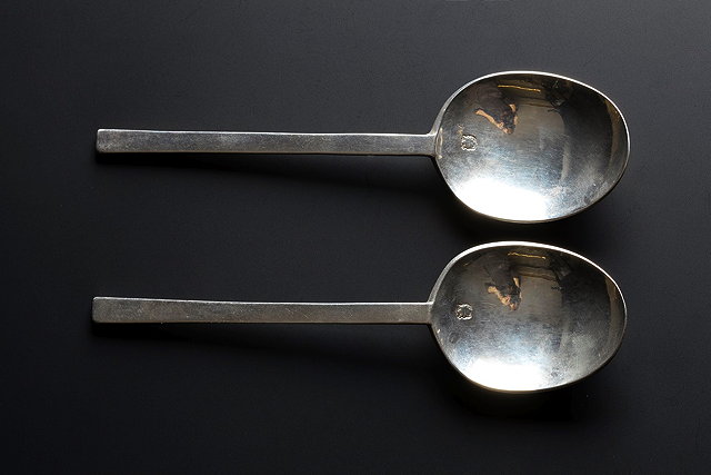 Appraisal: A PAIR OF COMMONWEALTH SILVER PURITAN SPOONS c - by