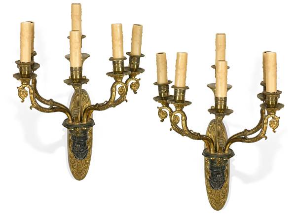 Appraisal: A pair of Empire style gilt and patinated bronze six