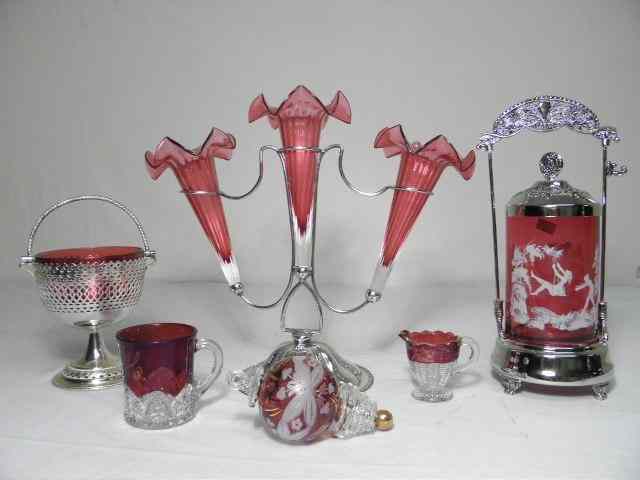 Appraisal: Lot of assorted cranberry glass Includes a cranberry flower epergne