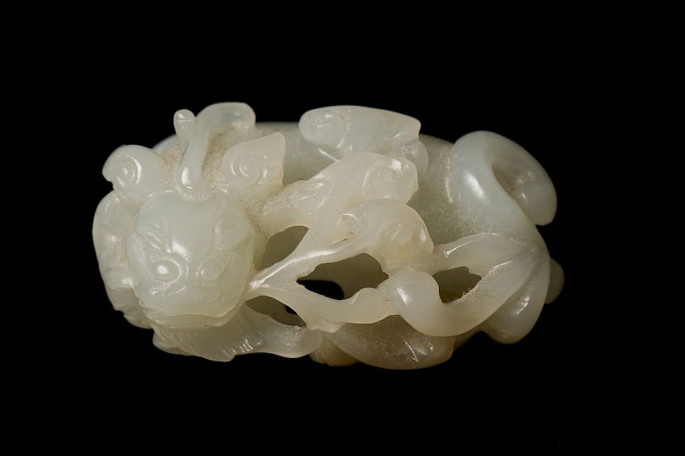 Appraisal: JADE QILIN JADE WITH RUYI LOTUS PENDANT QING A carving