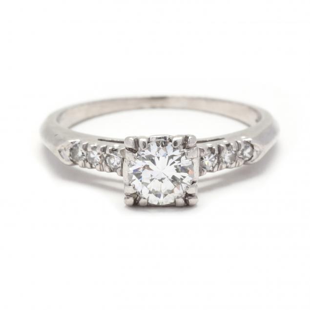 Appraisal: PLATINUM AND DIAMOND RING Centered on a transitional cut diamond